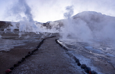 Exploring the fascinating geothermic fields of El Tatio with its steaming geysers and hot pools high up in the Atacama desert in Chile, South America