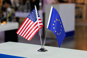 Table flags of the United States of America and the European Union together at some event, as a...