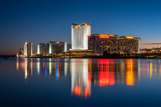 The lights of Laughlin's casinos reflect off the flowing water of the Colorado River.