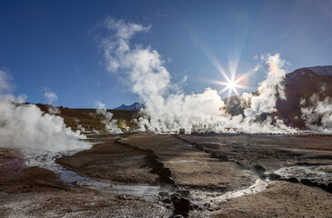 Exploring the fascinating geothermic fields of El Tatio with its steaming geysers and hot pools high up in the Atacama desert in Chile, South America