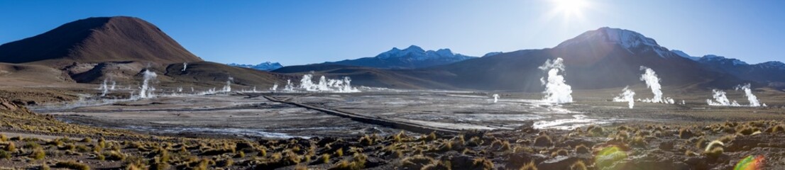Exploring the fascinating geothermic fields of El Tatio with its steaming geysers and hot pools high up in the Atacama desert in Chile, South America - Panorama