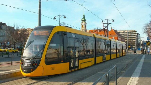 Trams excursion in city directions. A view of fast tramway have a city excursion against old city of Europe in the day light.