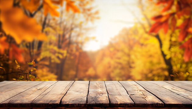 Empty wooden table with autumn theme in background