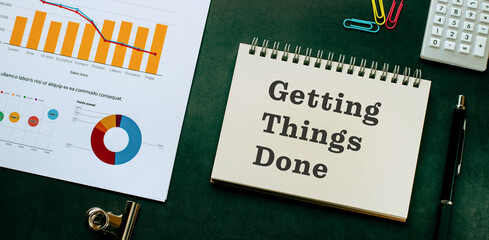 There is notebook with the word Getting Things Done. It is as an eye-catching image.