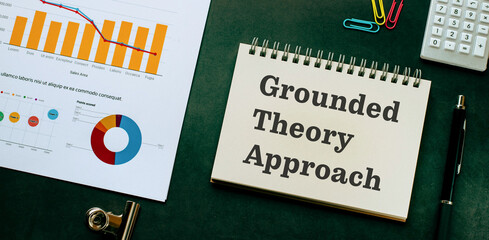 There is notebook with the word Grounded Theory Approach. It is as an eye-catching image.