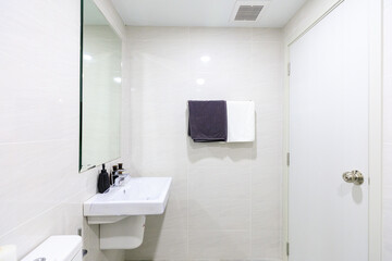 Closeup towel hanging on clothesline in the bathroom with space for texts