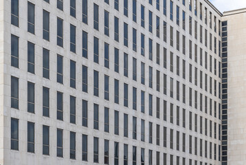 facade of an office building with marble tiling