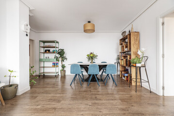 Living room of a house with wooden floors, metallic industrial style