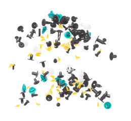 Car fender rivets fly explosion, colorful automobile fender rivets float explode, abstract cloud fly. Automobile plastic rivets splash throwing in Air. White background Isolated