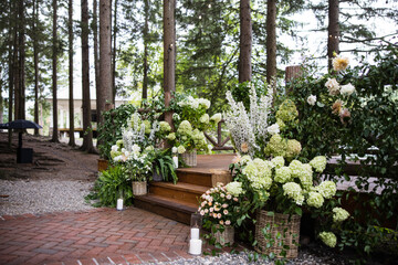 Fototapeta na wymiar Botanical Garden Wedding Flowers Event Bouquet Forest Fairytale Flower Events Table Setting Centerpiece Arrangement Design Candles