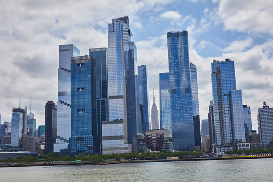 Modern blue skyscrapers making a beautiful cityscape of New York City from the water