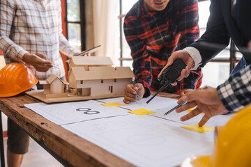 Factory Meeting Room of architect engineer meeting at working desk of blueprints construction concept. Engineer people concept