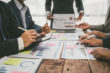 Group of business people doing bookkeeping, colleagues discussing, start planning, sharing ideas, working together in modern office. Meeting Teamwork successful business job interview ideas