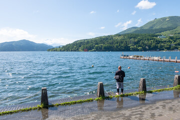 Fototapeta na wymiar People fishing at the Lake Ashi in Hakone city, Kanagawa prefecture, Japan