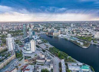 Fototapeta na wymiar Yekaterinburg city and pond aerial panoramic view at summer sunset.