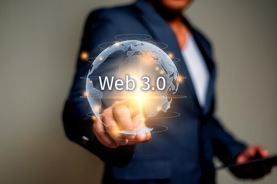 Web 3.0 concept. businessmand hand touch Web 3.0 and 3d  holo globe on virtual display for website development tecnology. blockchain, worldwide network.