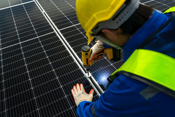 Solar panel installation, solar renewable energy installation, Asian engineer installing solar panels, electrical engineers and technicians, electricians checking solar panel system operation.