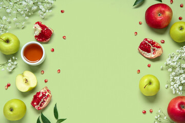 Composition with fresh fruits, gypsophila flowers and honey on color background. Rosh hashanah (Jewish New Year) celebration
