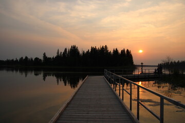 Fototapeta premium Hazy Sunset On The Lake, Elk Island National Park, Alberta