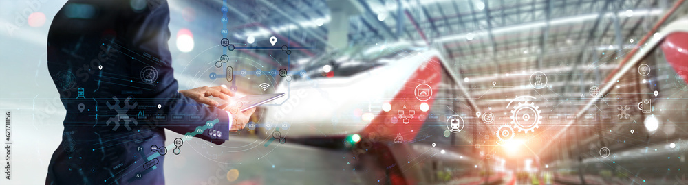 Poster Engineer uses a tablet to inspect and analyze the route of a networked train information system before releasing the train from a major station junction. modern industry and transportation.