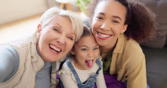 Happy family, tongue out and selfie on sofa with mother, grandmother and girl child in their home. Face, love and portrait of interracial women in living room for photo, fun or silly profile picture