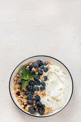 Healthy breakfast, cereal with berries and yogurt.