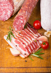 Various Smoked sausage with rosemary and peppercorns tomatoes and garlic