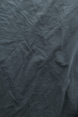 Wrinkled gray bed sheets as background