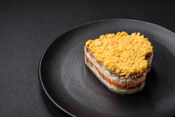 Delicious fresh mimosa salad with canned fish, egg, moinese, cheese, salt and spices