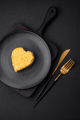 Delicious fresh mimosa salad with canned fish, egg, moinese, cheese, salt and spices