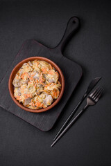 Delicious boiled beef or pork tongue sliced with carrots, onions, sour cream and spices