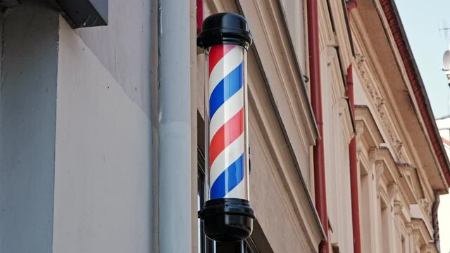 Barbershop Sign with Rotating Clored Stripes Helix Pole