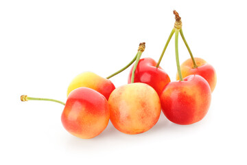 Many sweet yellow cherries on white background