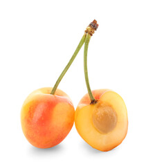Sweet yellow cherry with half on white background