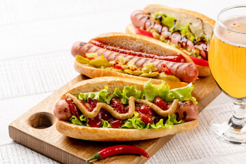 Various hot dog and beer