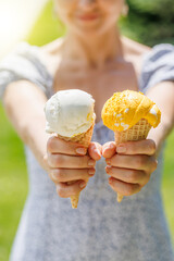 Refreshing ice cream in waffle cones with lemon flavour