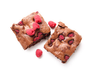 Pieces of raspberry chocolate brownie on white background