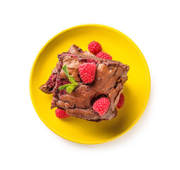 Plate with pieces of raspberry chocolate brownie on white background