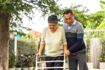 Senior happy love asian senior couple relaxing and talking together walk in park at home, wife, family, elderly, care, health, insurance.Retirement healthcare couple concept