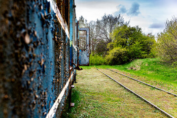 Old electric train wagon perspective background