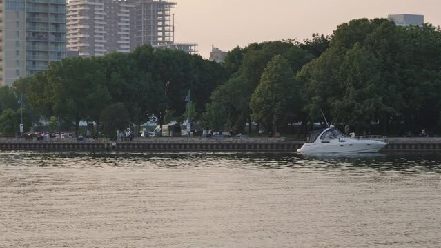 Lakeshore waterfront river lake bank boat yacht water evening Credit river harbor peaceful Mississauga Ontario Canada North America