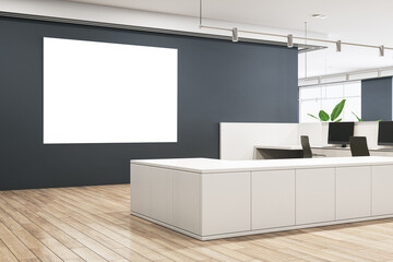 Modern concrete and wooden office lobby interior with empty white mock up frame on gray wall and various items. 3D Rendering.
