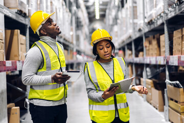 Portrait african american engineer team shipping order detail on tablet export and import,goods,factory,warehouse,international trade,transportation,cargo ship,logistic,distribution.business industry