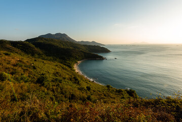 Sunset view of landscape with sea and mountain and sky