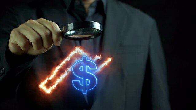 Businessman showing magnifying glass focus on fire up trend arrow and glowing neon line dollar sign. Money, currency increase, profit, investment, growth business, economy, finance and success concept