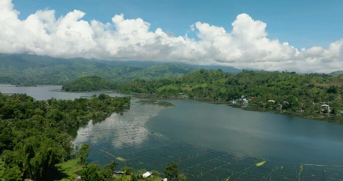 Lake Sebu, South Cotabato, Philippines. Tropical Landscape with blue sky and clouds. Aerial drone view in Mindanao.