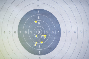 Hole in the gun shooting training target from shooter shooter.
