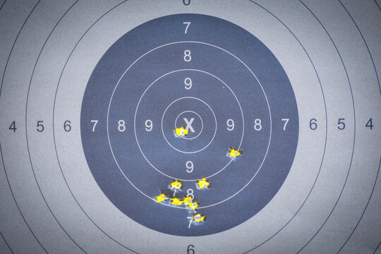Hole in the gun shooting training target from shooter shooter.

