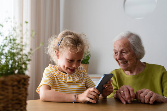 Carefree woman jumping at beach