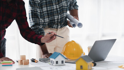 Creative Engineer and Architect Meeting for Collaborative Design and Project Planning in the Workplace.